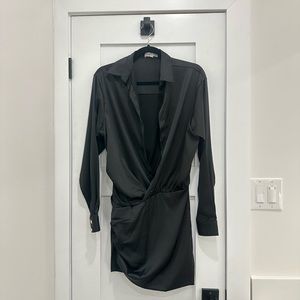 Black low-cut dress with gold buttons